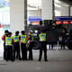 Security guards at a Hangzhou subway station on Aug. 3.